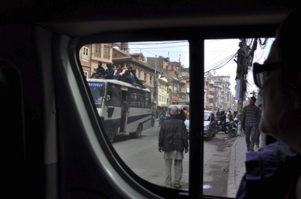 Because of the fuel crisis, many public vehicles allow riders on the roof so more people can ride in fewer vehicles.